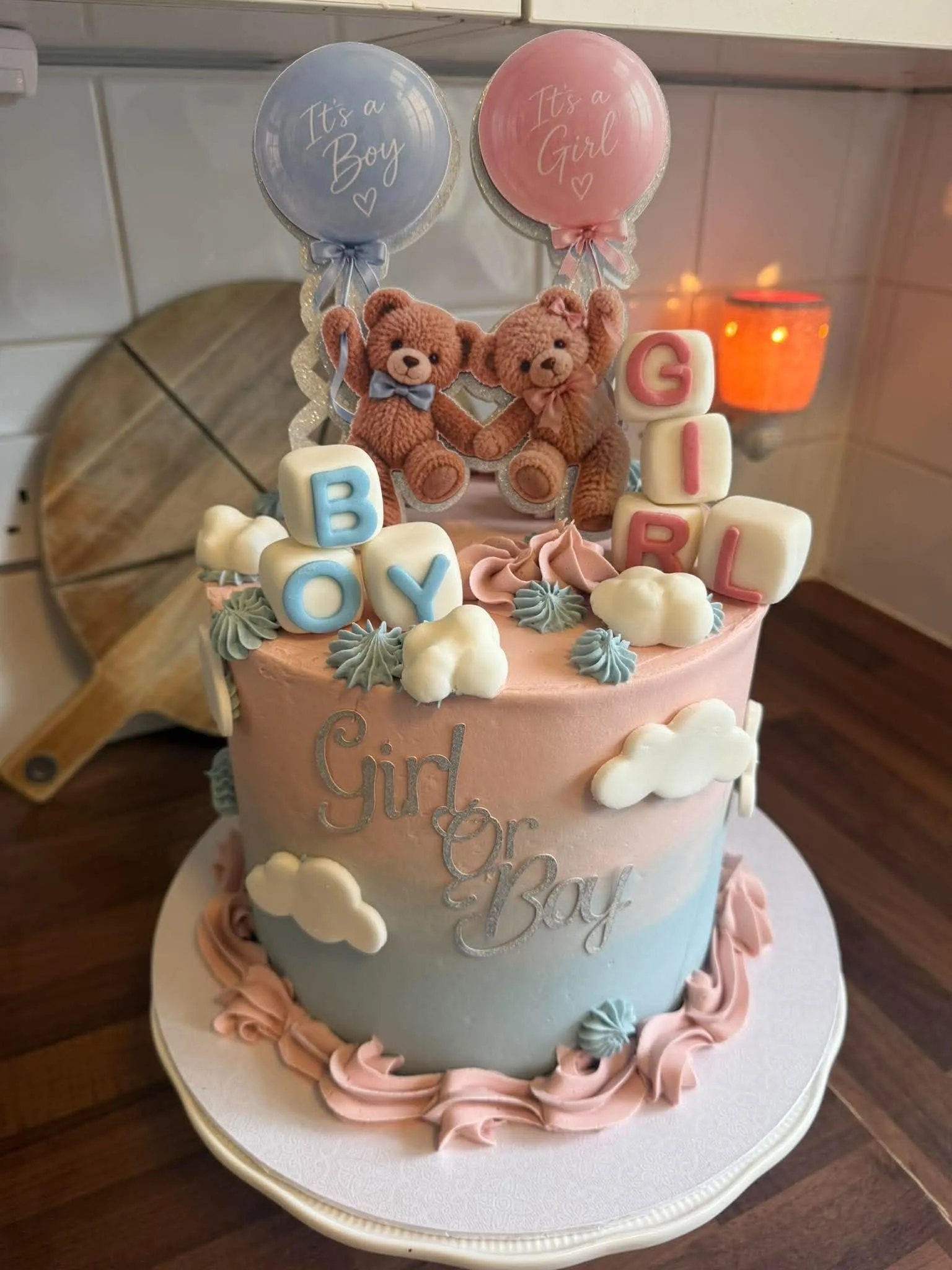 Cake 2: A pink and blue gender reveal cake with teddy bears and balloons